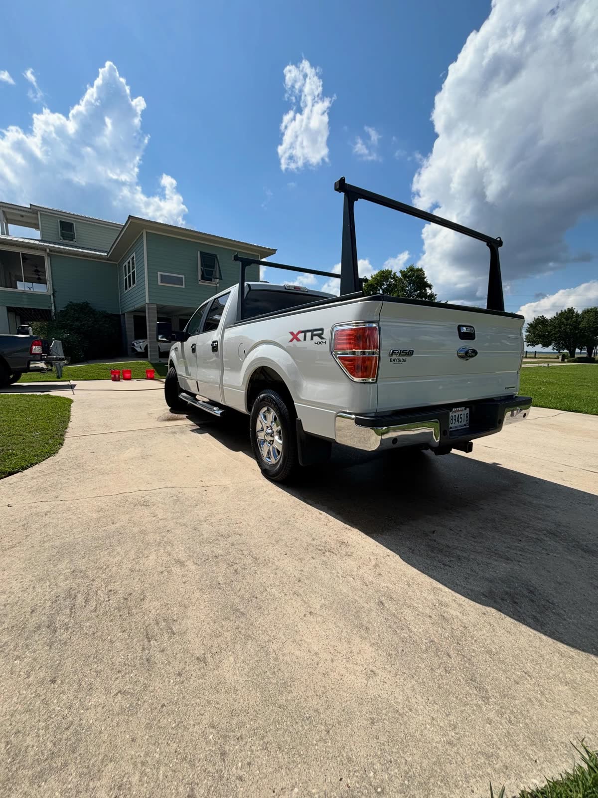 White Ford F-150 in for an assessment